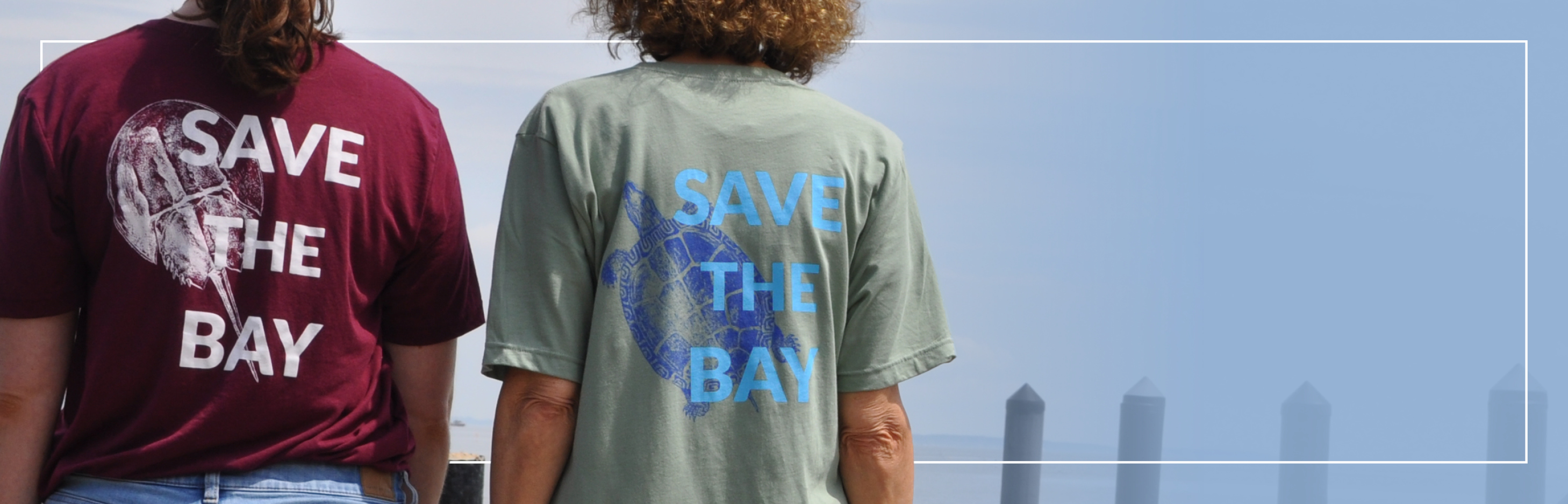 Two people wearing Save the Bay t-shirts.