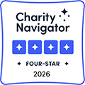 Charity Navigator four-star rating badge, featuring the text “Charity Navigator” above four stars and the words “Four-Star” below.
